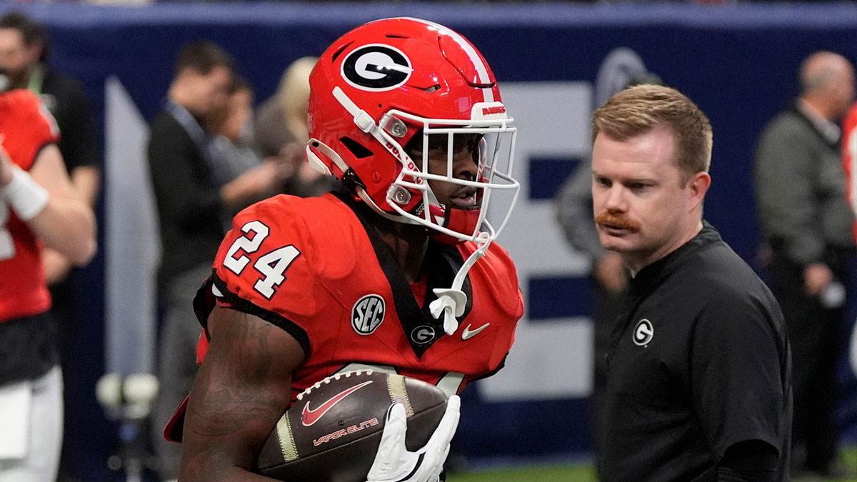 Georgia defensive back Malaki Starks (24) warms up before the start of the SEC championship game against Texas in Atlanta, on Saturday, Dec. 7, 2024.