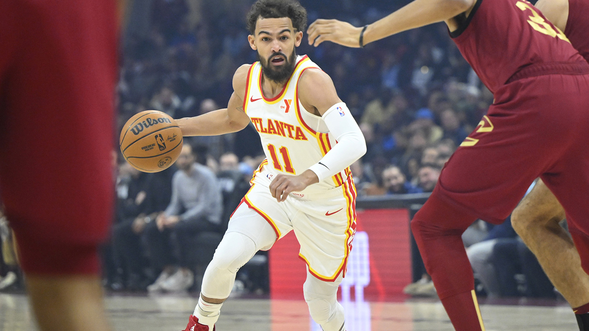 Atlanta Hawks Guard Trae Young (11) Dribbles vs. Cliveland Cavaliers in the first quarter at a missile mortgage field.