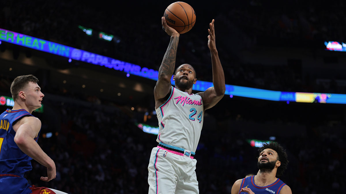 Miami Heat forward Haywood Highsmith (24) shoots the ball past Denver Nuggets guard Jamal Murray (27) during the third quarter at the Cassia Center.