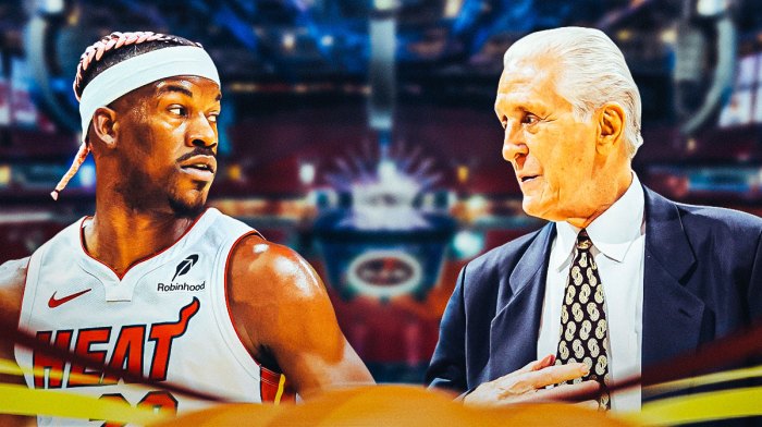 Miami Heat star Jimmy Butler and Pat Riley in front of Kaseya Center.