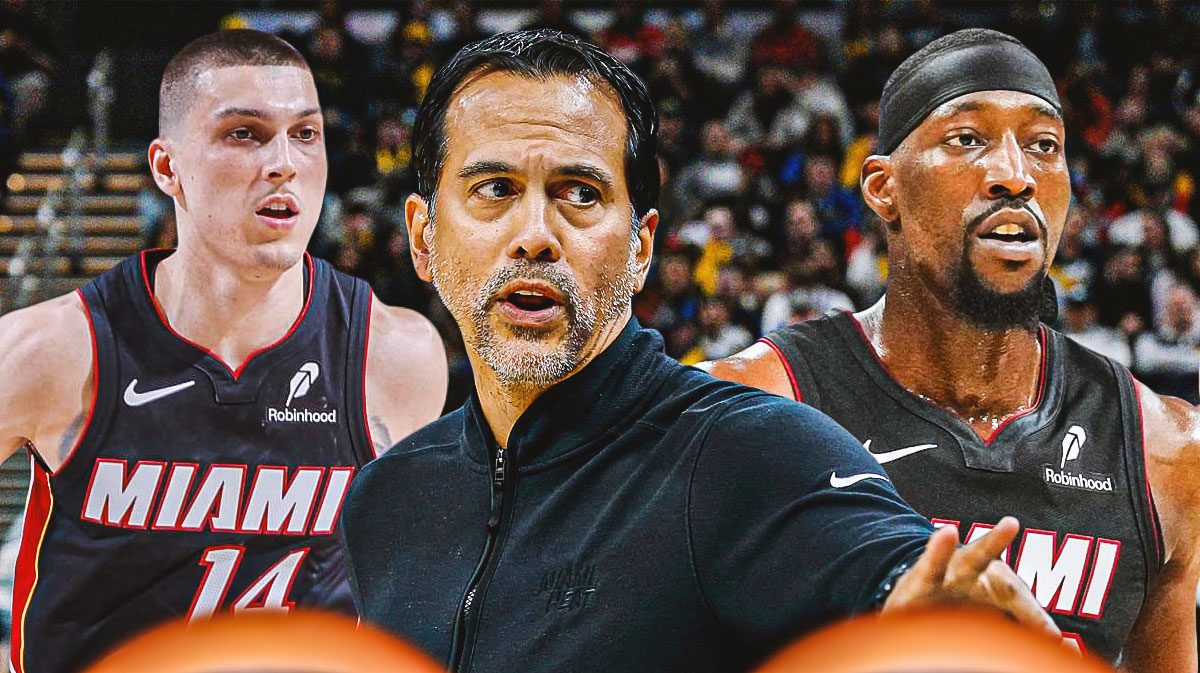 Miami Heat head coach Erik Spoelstra in the middle of Tyler Herro and Bam Adebayo in front of Kaseya Center.