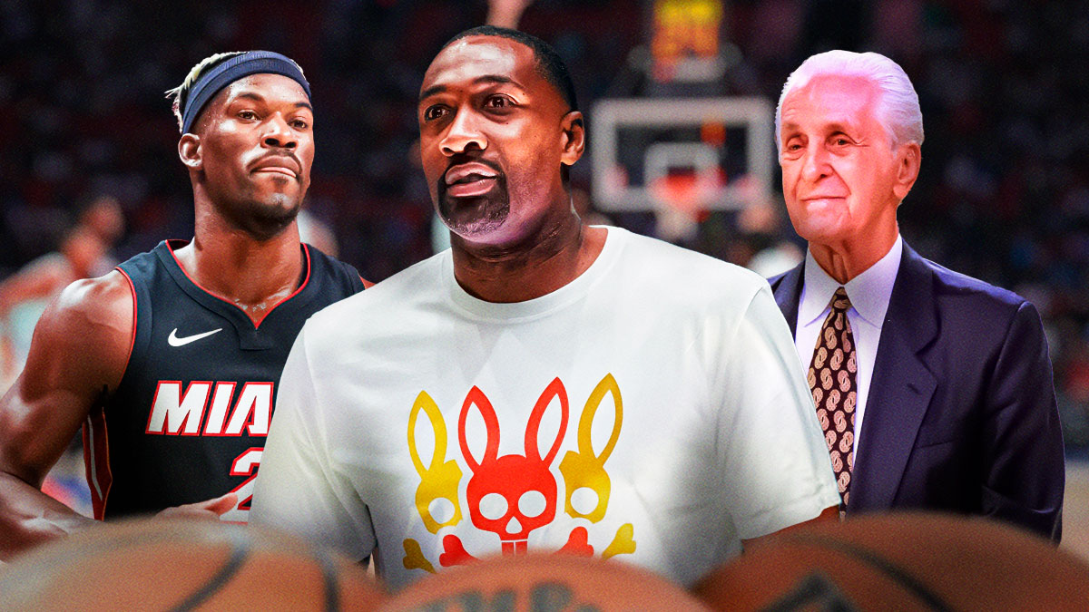 Heat president Pat Riley next to Heat forward Jimmy Butler with retired NBA player Gilbert Arenas between them