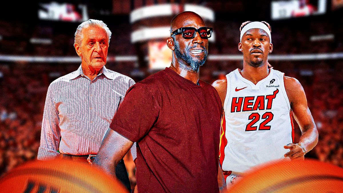 Hall of Fame forward Kevin Garnett in street clothes between Heat forward Jimmy Butler and Heat president Pat Riley