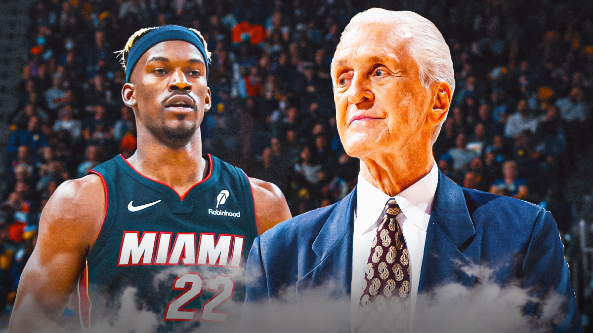 Jimmy Butler (Heat) and Pat Riley (Heat) both looking serious