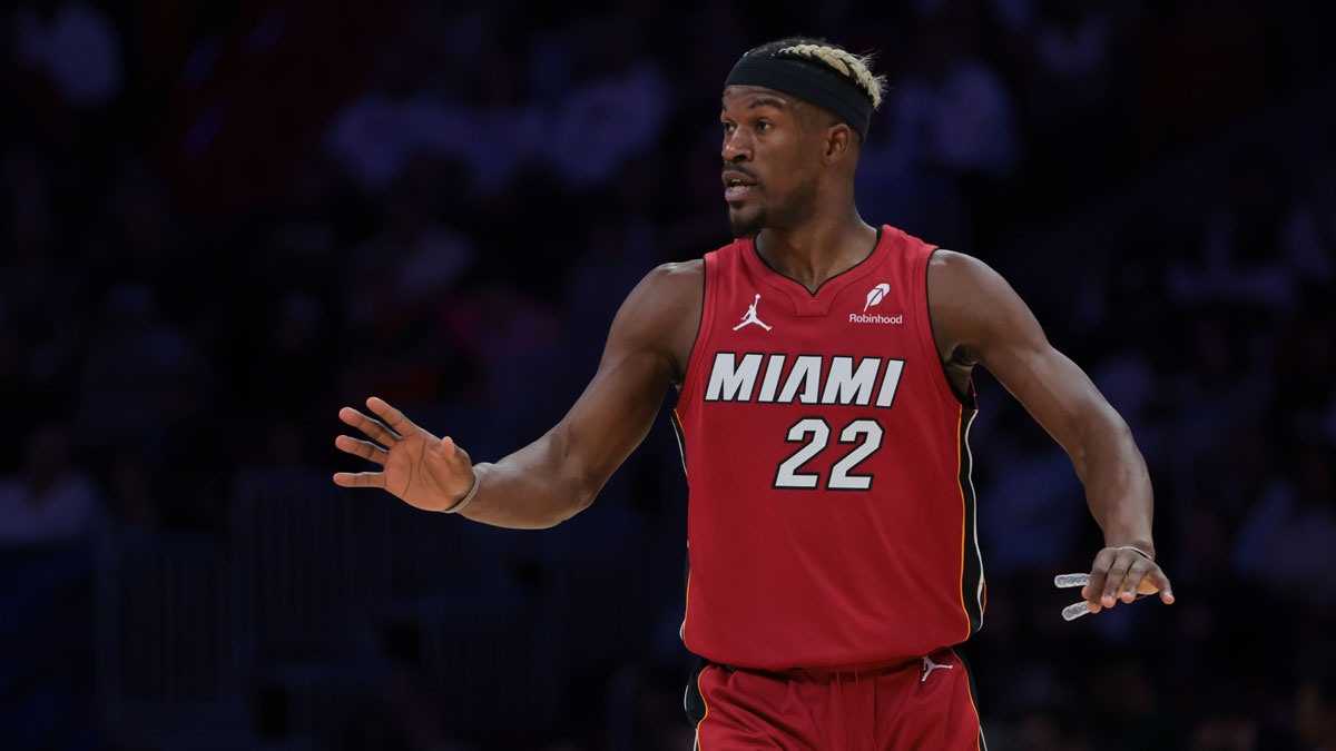 Miami Heat forward Jimmy Butler (22) reacts against the Portland Trail Blazers during the third quarter at Kaseya Center. 