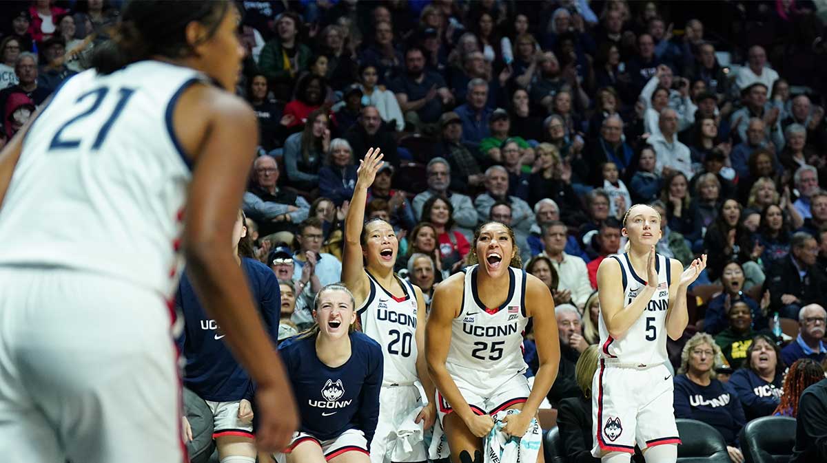 The UConn Huskies bench reacts after a basket by forward Sarah Strong (21) against the Iowa State Cyclones in the second half.