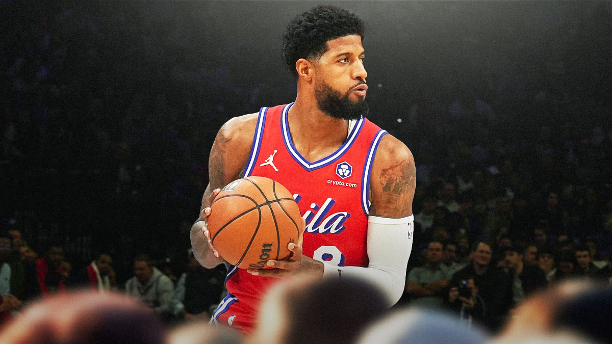 Philadelphia 76ers player Paul George with the 76ers arena in the background, center comments