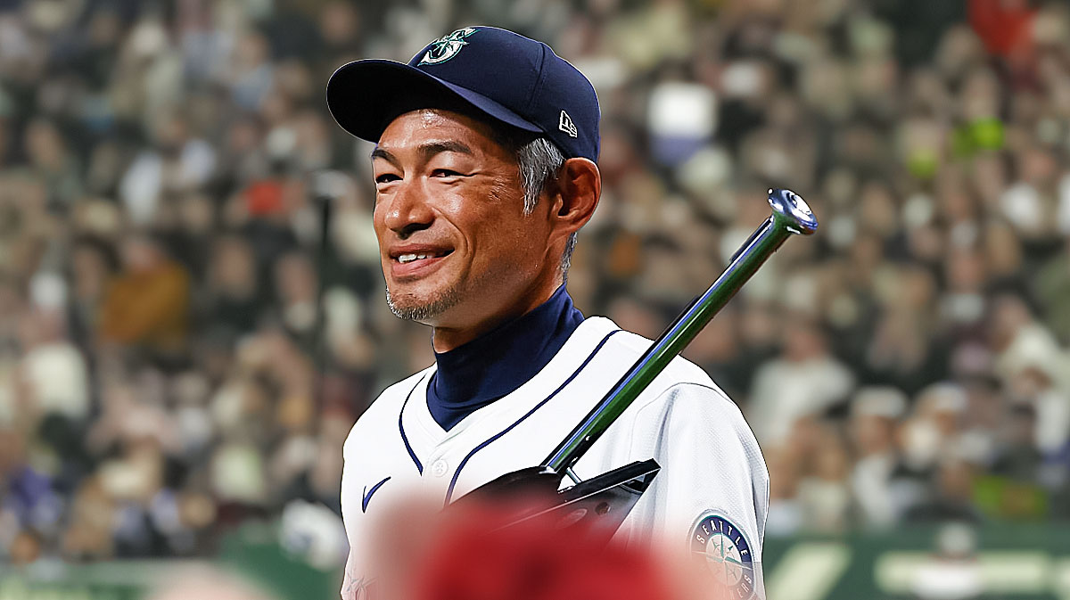 ro Suzuki looking emotional wearing Mariners gear.