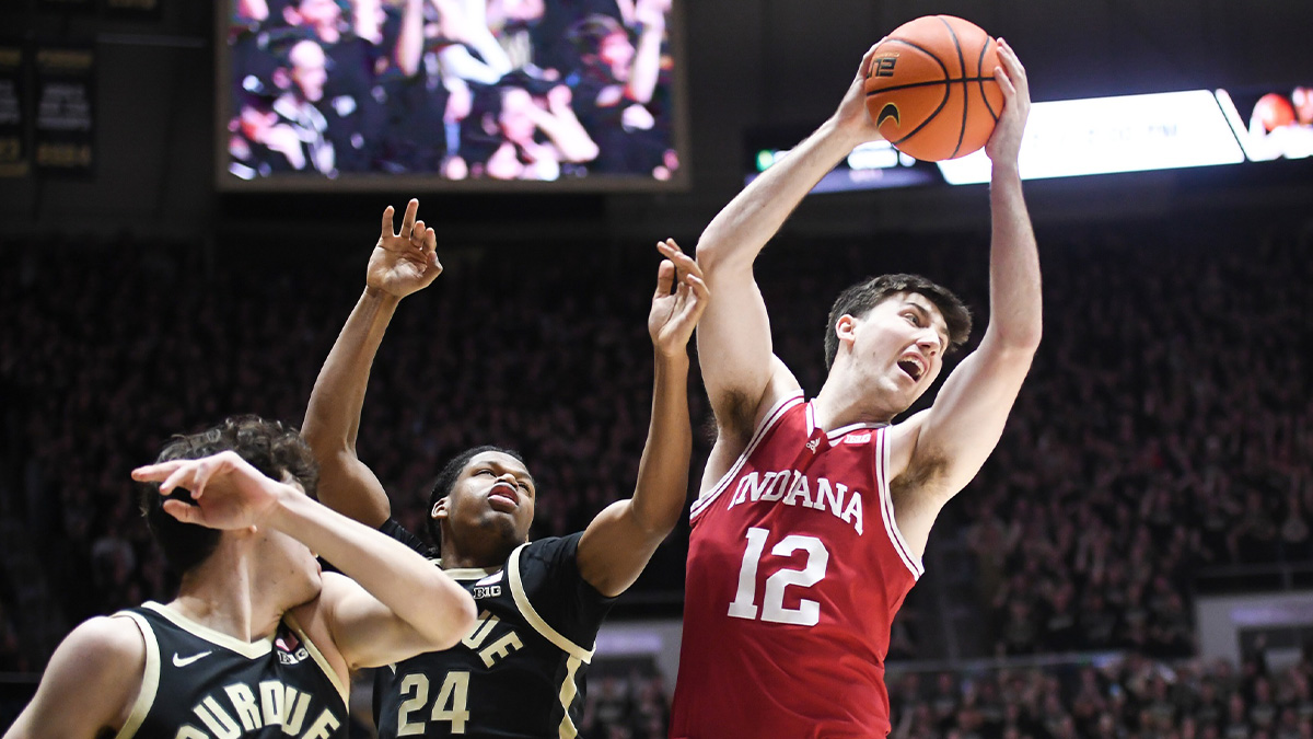 Indiana Hoosiers center Langdon Hatton (12) rebounds the ball against Purdue Boilermakers guard Gicarri Harris (24) during the first half at Mackey Arena.