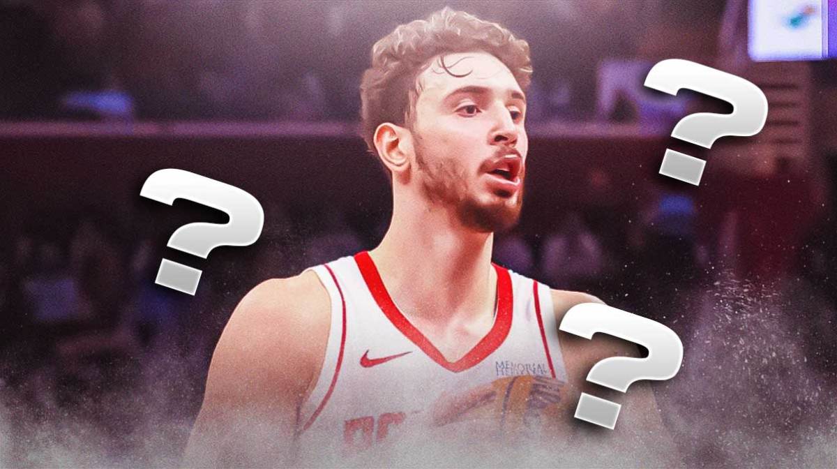 Photo: Alperen Sengun with question marks around him in Rockets jersey