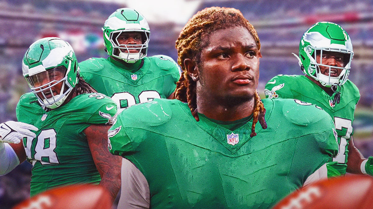Lewis Cine wearing an Eagles uniform next to Jordan Davis, Jalen Carter, and Nakobe Dean in front of the Eagles stadium.