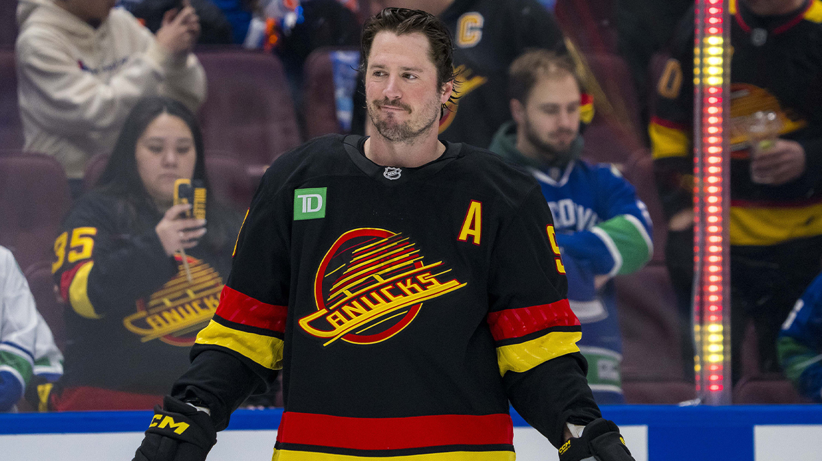 Vancouver Canucks forward JT Miller (9) smiles during warmups before the game against the Edmonton Oilers at Rogers Arena.