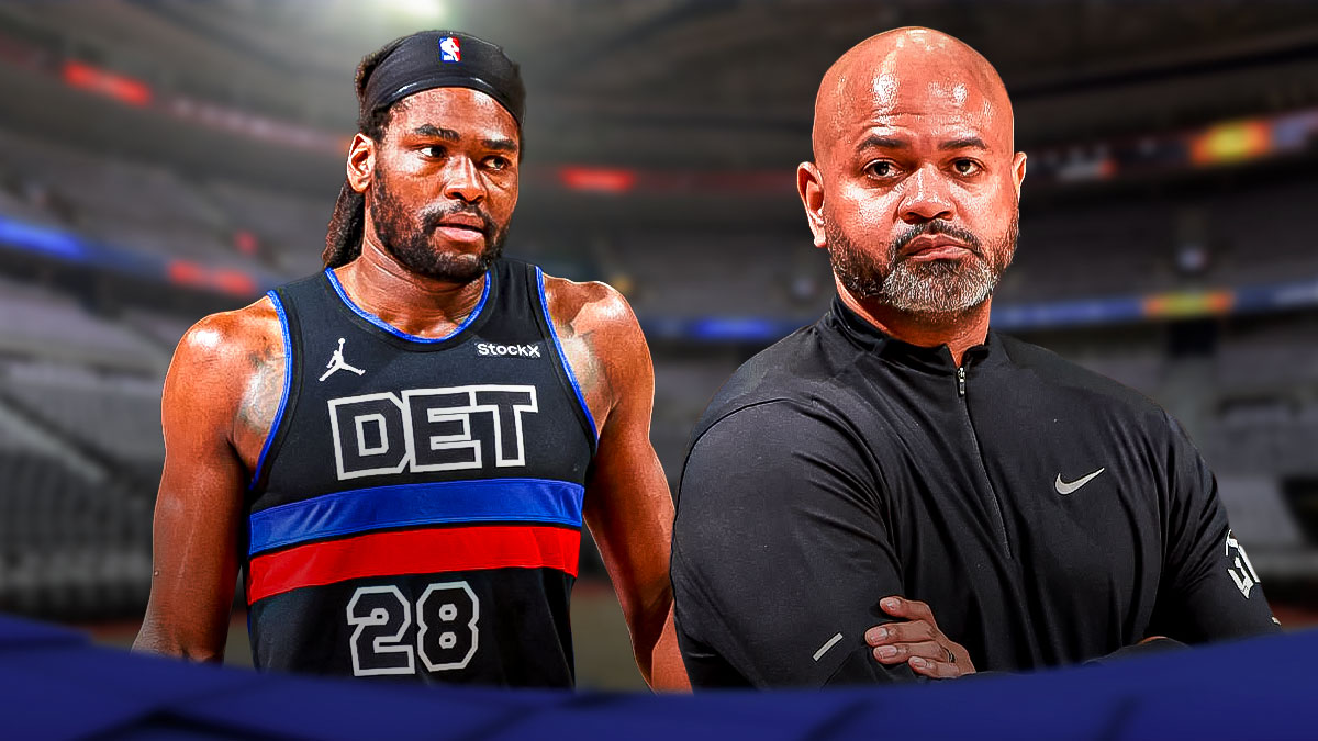 JB Bickerstaff next to Isaiah Stewart in front of the Pistons stadium.