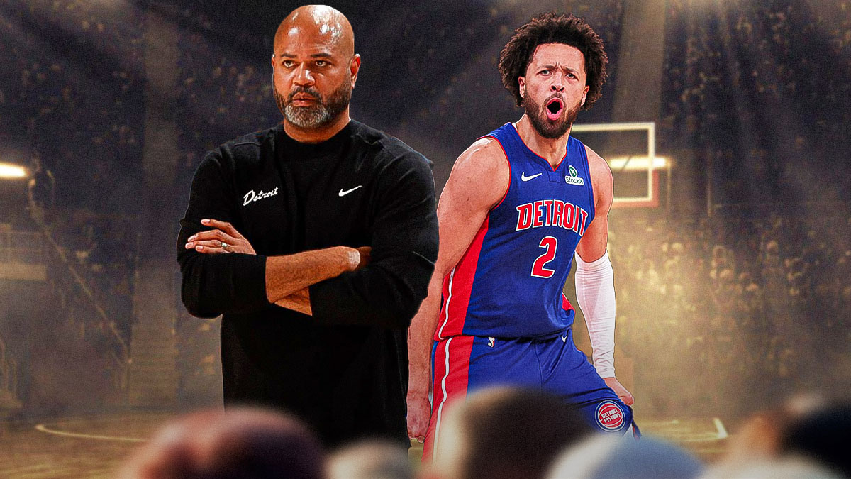 JB Bickerstaff next to Cade Cunningham in the Pistons arena.