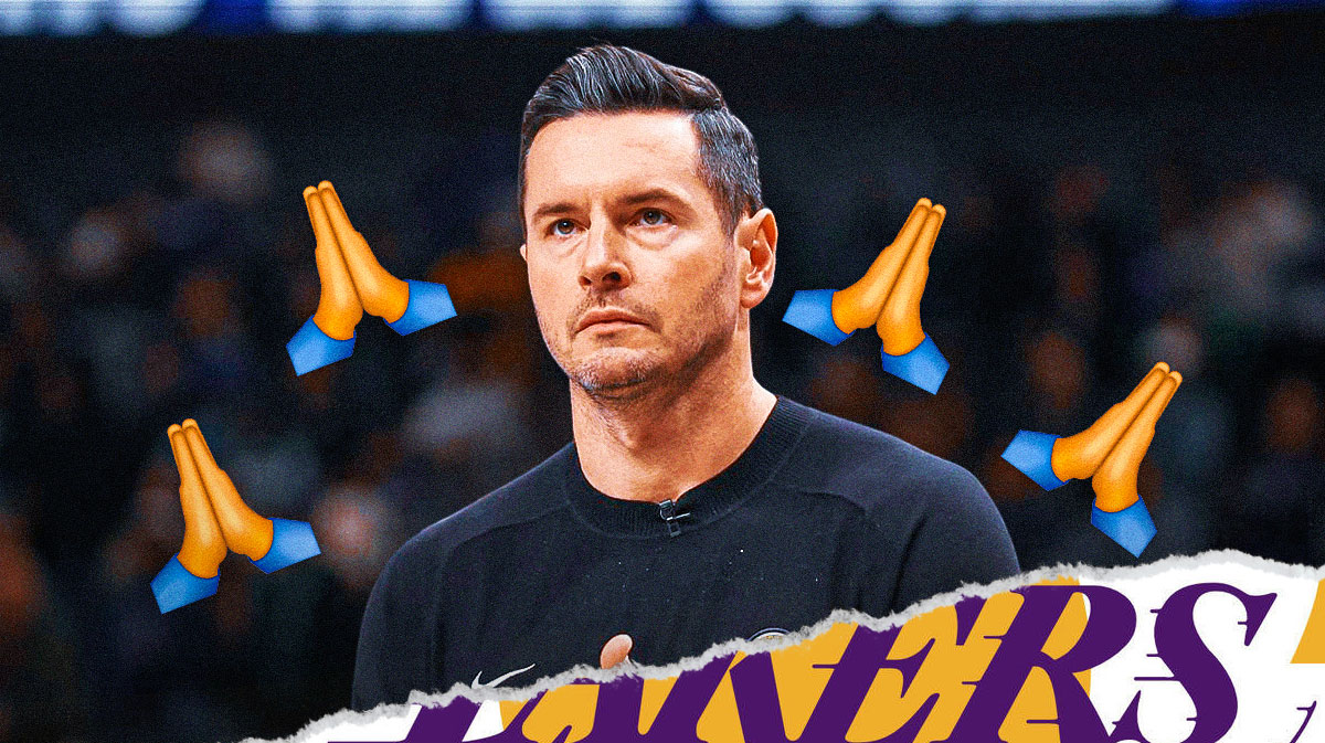 JJ Redick with prayer hands around the picture.