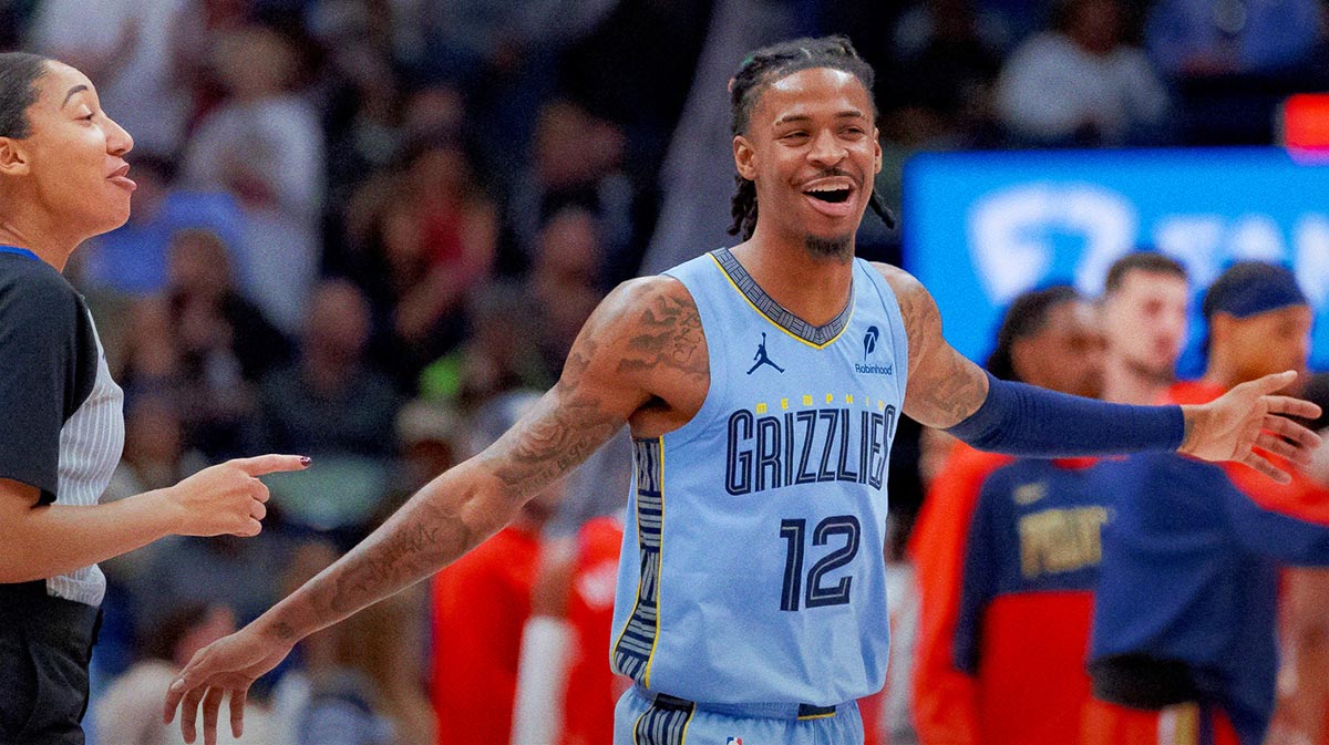 Memphis Grizzlies guard Ja Morant (12) reacts at halftime against the Memphis Grizzlies at Smoothie King Center.