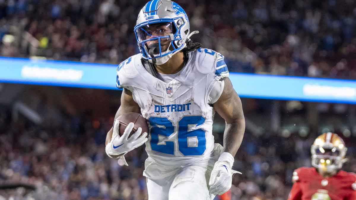Detroit Lions running back Jahmyr Gibbs (26) scores a touchdown against San Francisco 49ers safety Talanoa Hufanga (29) during the fourth quarter at Levi's Stadium.