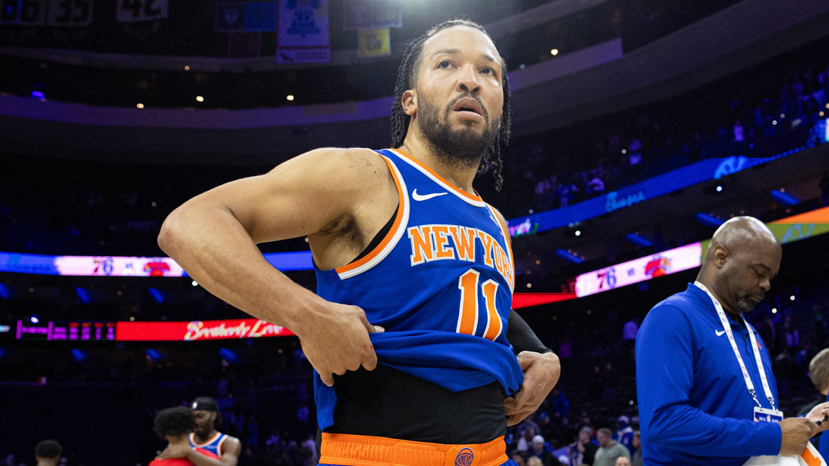 New York Knicks guard Jalen Branson (11) leaves the court after an overtime win against the Philadelphia 76ers at the Wells Fargo Center.