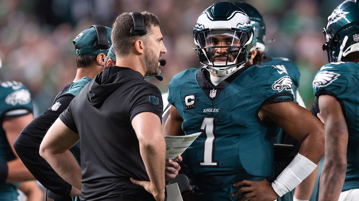 Philadelphia Eagles quarterback Jalen Hurts (1) talks with head coach Nick Sirianni during a timeout in the first quarter against the Atlanta Falcons at Lincoln Financial Field.