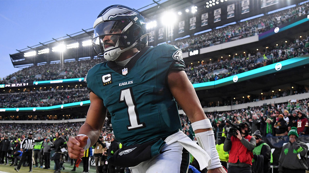 Philadelphia Eagles quarterback Jalen Hurts (1) reacts after a touchdown against the Washington Commanders during the second half in the NFC Championship game at Lincoln Financial Field.