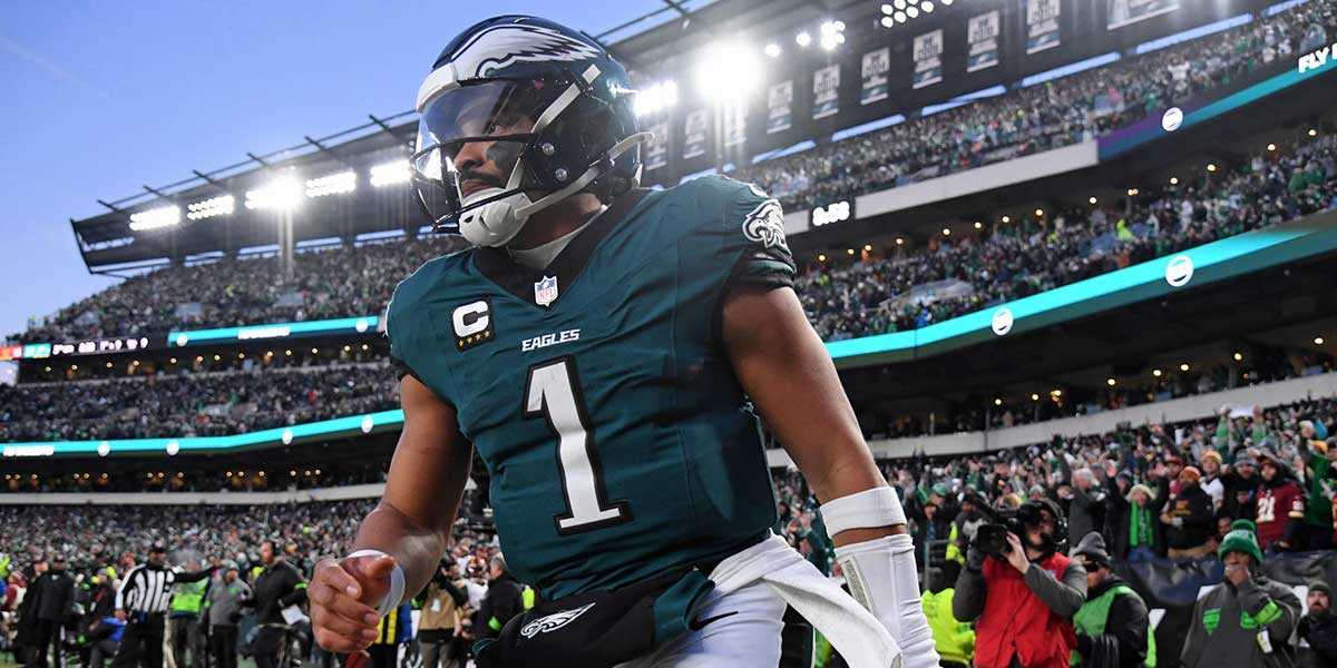 Jan 26, 2025; Philadelphia, PA, USA; Philadelphia Eagles quarterback Jalen Hurts (1) reacts after a touchdown against the Washington Commanders during the second half in the NFC Championship game at Lincoln Financial Field. Mandatory Credit: Eric Hartline-Imagn Images