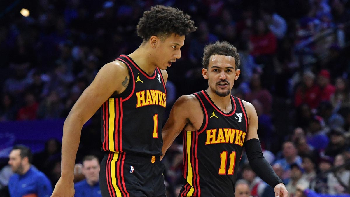 Atlanta Hawks forward Jalen Johnson (1) and guard Trae Young (11) against the Philadelphia 76ers during the fourth quarter at Wells Fargo Center.