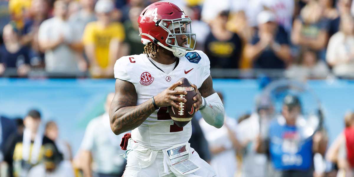 Dec 31, 2024; Tampa, FL, USA; Alabama Crimson Tide quarterback Jalen Milroe (4) looks to throw against the Michigan Wolverines during the second half at Raymond James Stadium. Mandatory Credit: Matt Pendleton-Imagn Images