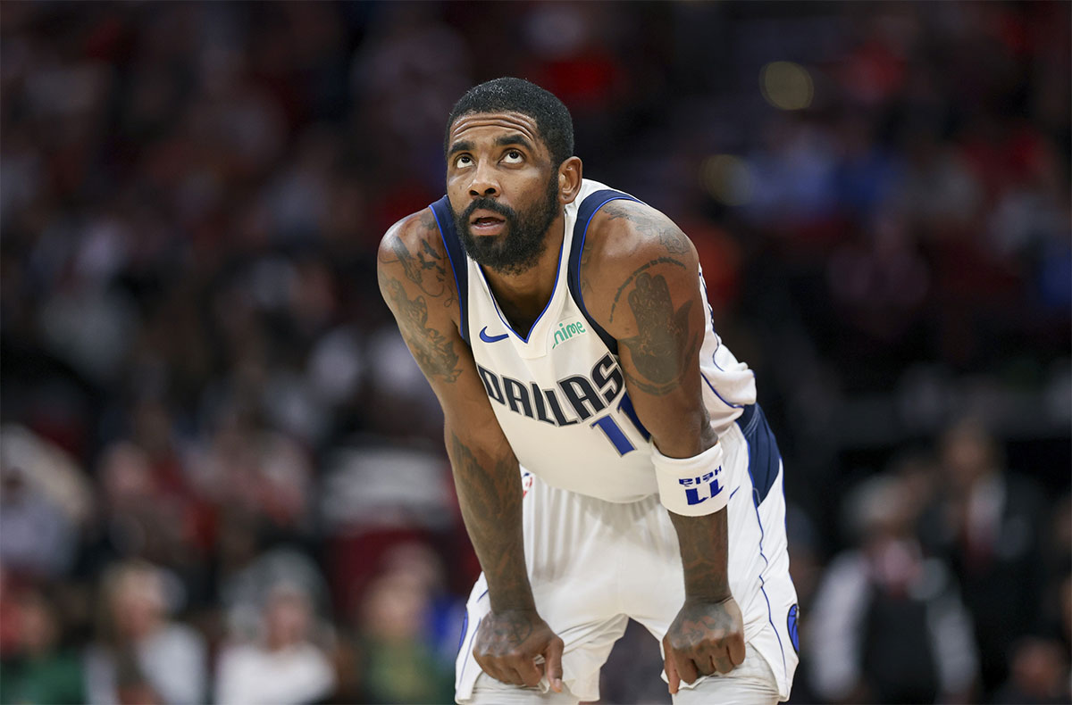Dallas Mavericks guard Kyrie Irving (11) looks up during the fourth quarter against the Houston Rockets at Toyota Center.