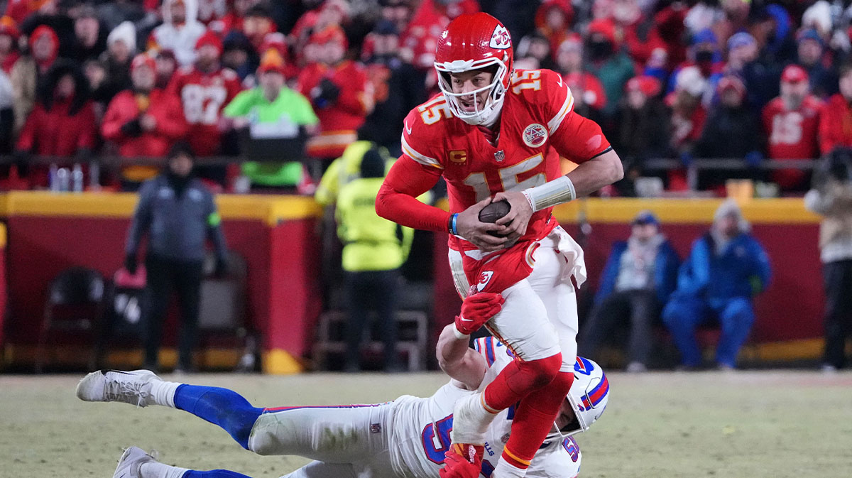 Kansas City Chiefs quarterback Patrick Mahomes (15) rushes the ball against the Buffalo Bills during the second half in the AFC Championship game at GEHA Field at Arrowhead Stadium.