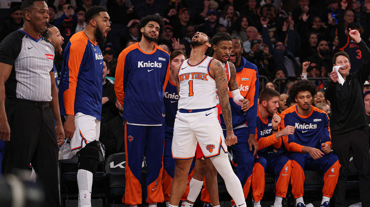 New York Knicks Guard Cameron Paine (1) reacts after making three points of the basket during the second half against Memphis Grizzlies in Madison Square Garden.