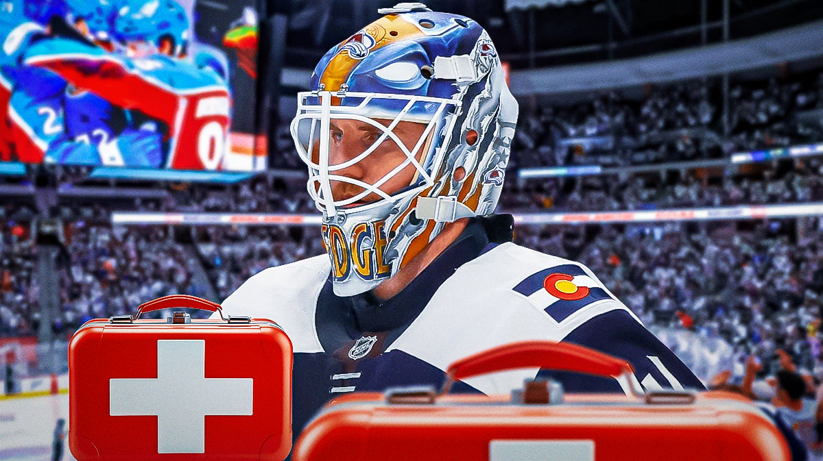 Scott Wedgewood looking stern, first aid kit, hockey rink in background
