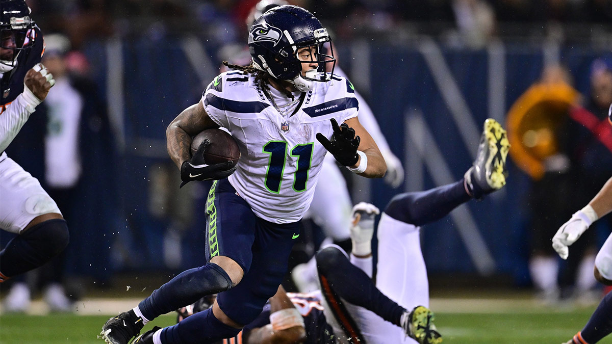 Seattle Seahawks wide receiver Jaxon Smith-Njigba (11) runs after a catch against the Chicago Bears during the third quarter at Soldier Field.