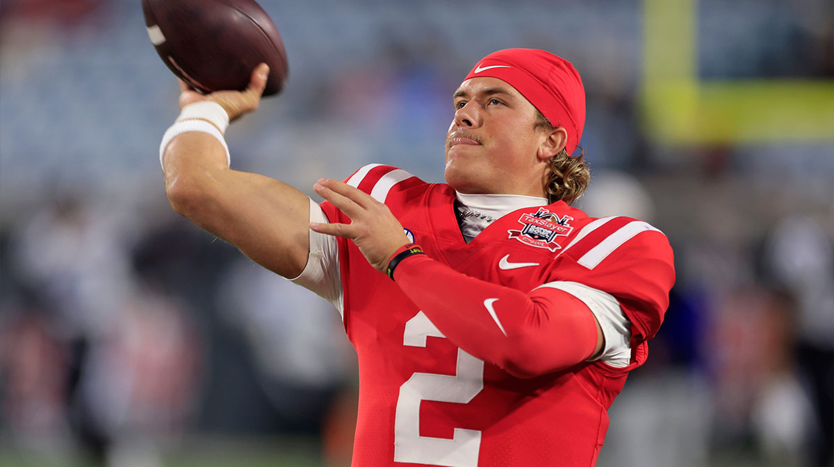 Mississippi Rebels quarterback Jaxson Dart (2) warms up before the TaxSlayer Gator Bowl Thursday, Jan. 2, 2025 at EverBank Stadium in Jacksonville, Fla.