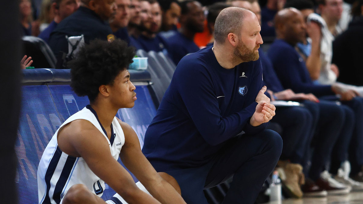 Memphis Grizzlies forward Jaylen Wells (0) and head coach Taylor Jenkins look on during the fourth quarter against the Utah Jazz at FedExForum.