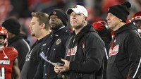 Louisville Cardinals head coach Jeff Brohm looks toward the scoreboard during the second half against the Pittsburgh Panthers at L&N Federal Credit Union Stadium. Louisville defeated Pittsburgh 37-9.