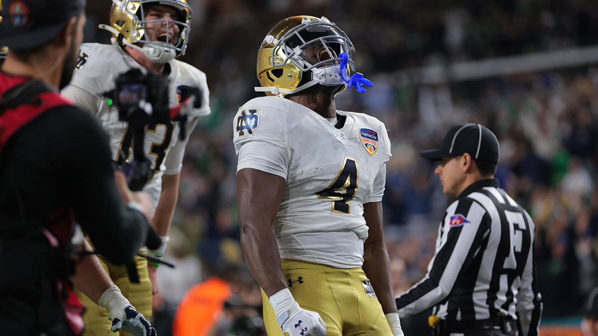Notre Dame Fighting Irish running back Jeremiyah Love (4) celebrates a touch down in the second half against the Penn State Nittany Lions in the Orange Bowl at Hard Rock Stadium.