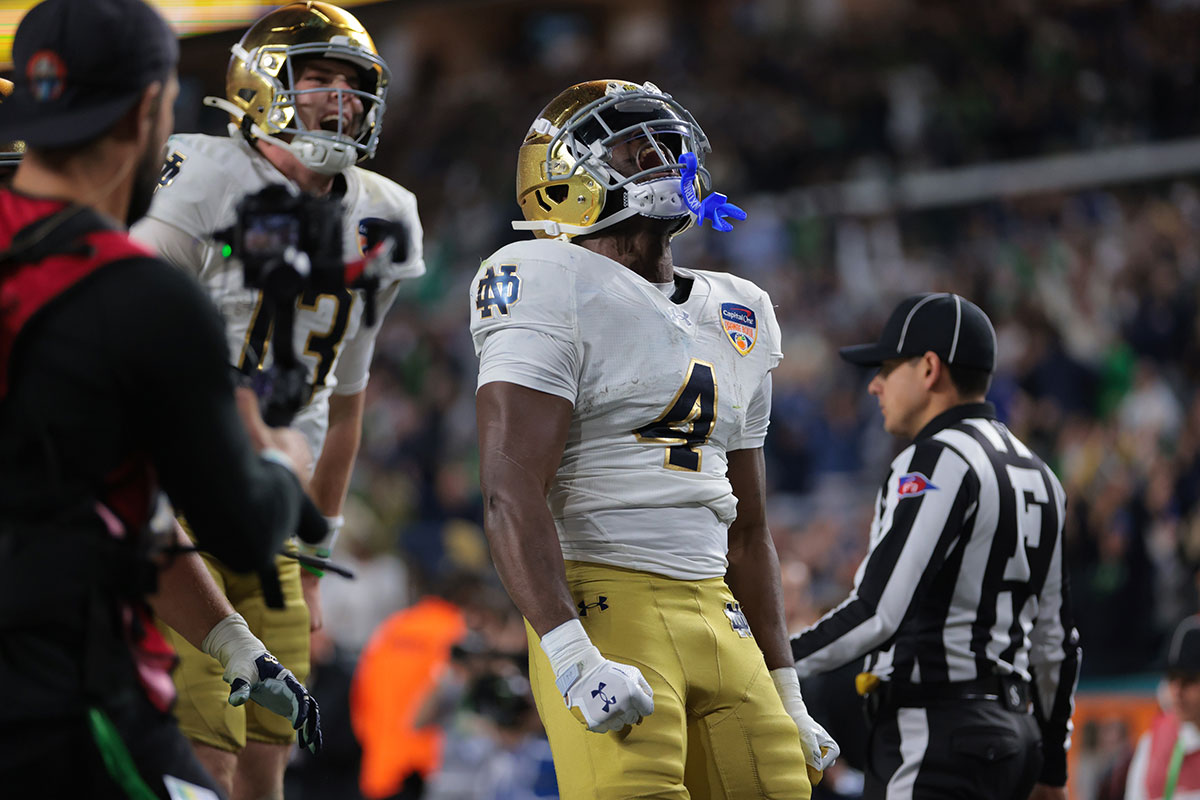 Notre Dame Fighting Irish running back Jeremiyah Love (4) celebrates a touch down in the second half against the Penn State Nittany Lions in the Orange Bowl at Hard Rock Stadium.