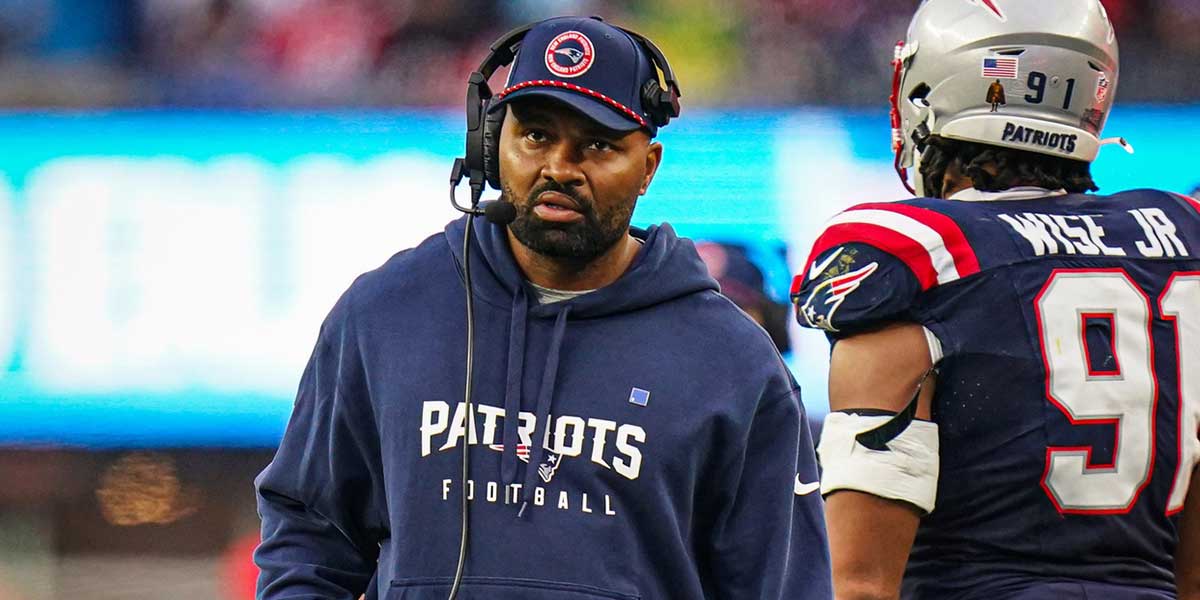 Dec 28, 2024; Foxborough, Massachusetts, USA; New England Patriots head coach Jerod Mayo watches from the sideline as they take on the Los Angeles Chargers at Gillette Stadium. Mandatory Credit: David Butler II-Imagn Images