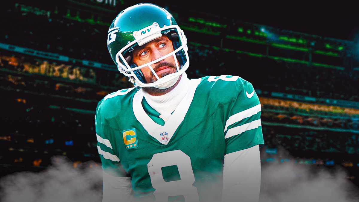 Aaron Rodgers with darkness around him.
