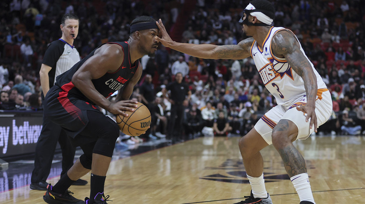 Miami Heat forward Jimmy Butler (22) guards Phoenix Suns guard Bradley Beal (3) during the fourth quarter at Cassia Center.