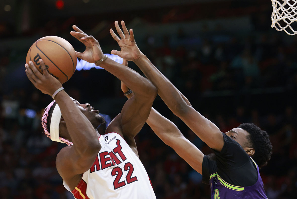 New Orleans Pelicans forward Herbert Jones (2) defends Miami Heat forward Jimmy Butler (22) during the second half at Kaseya Center.