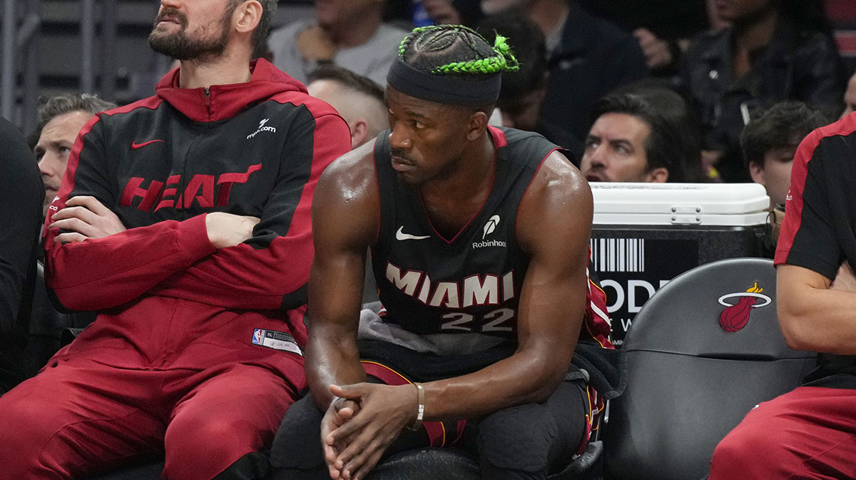 Miami Heat forward Jimmy Butler (22) watches from the bench during the second half at the Casey Center.