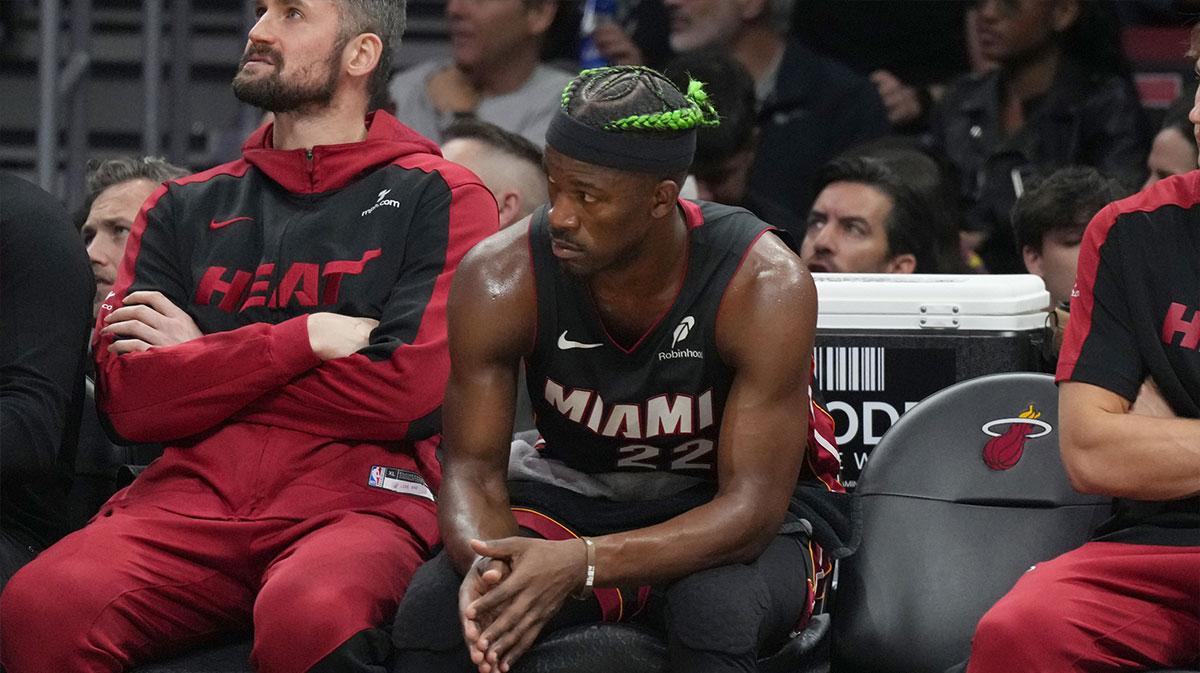 Miami Heat forward Jimmy Butler (22) looks on from the bench during the second half at Kaseya Center.