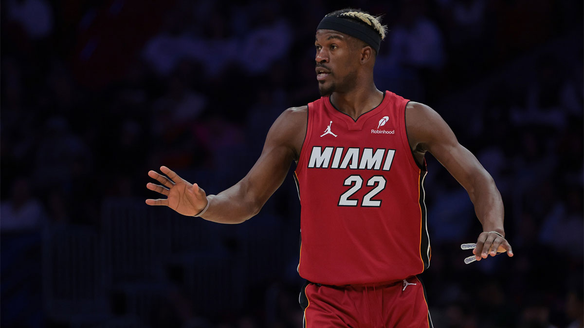 Miami Heat forward Jimmy Butler (22) reacts against the Portland Trail Blazers during the third quarter at Kaseya Center.