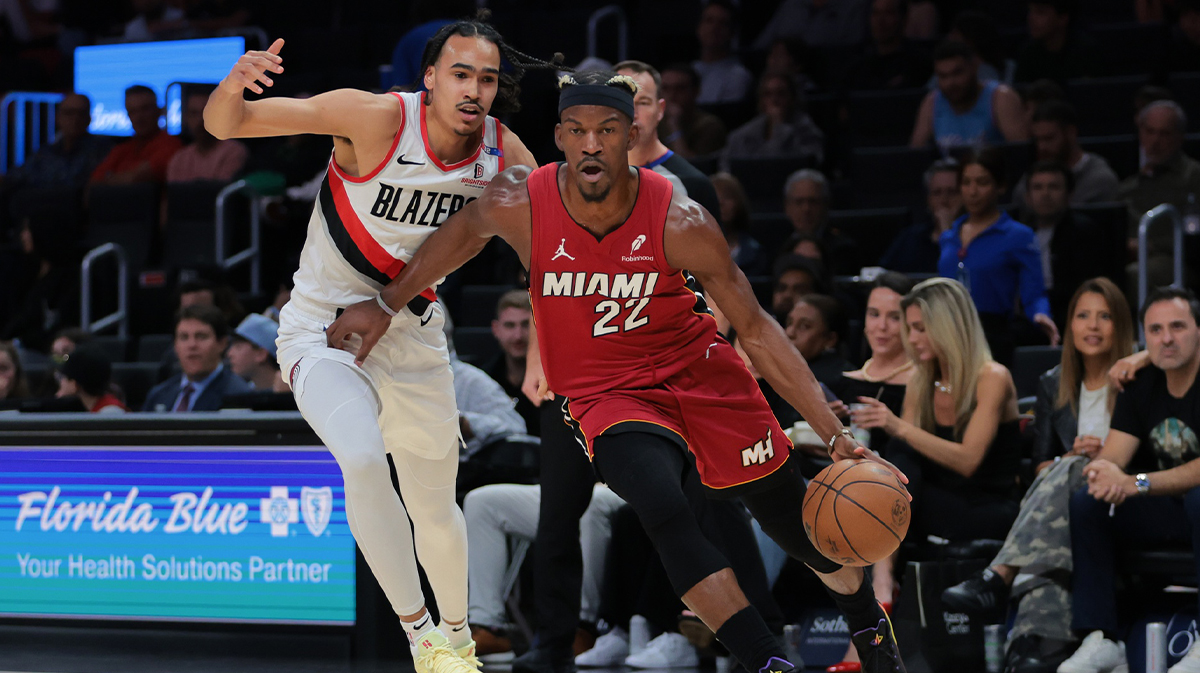 Miami Heat forward Jimmy Butler (22) drives to the basket past Portland Trail Blazers guard Dalan Bunton (5) during the first quarter at the Casey Center.