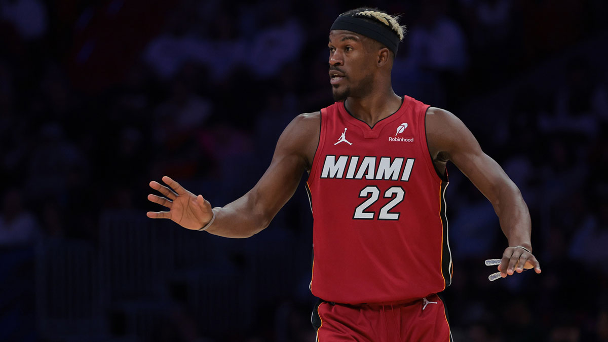 Miami Heat forward Jimmy Butler (22) reacts against the Portland Trail Blazers during the third quarter at Kaseya Center.