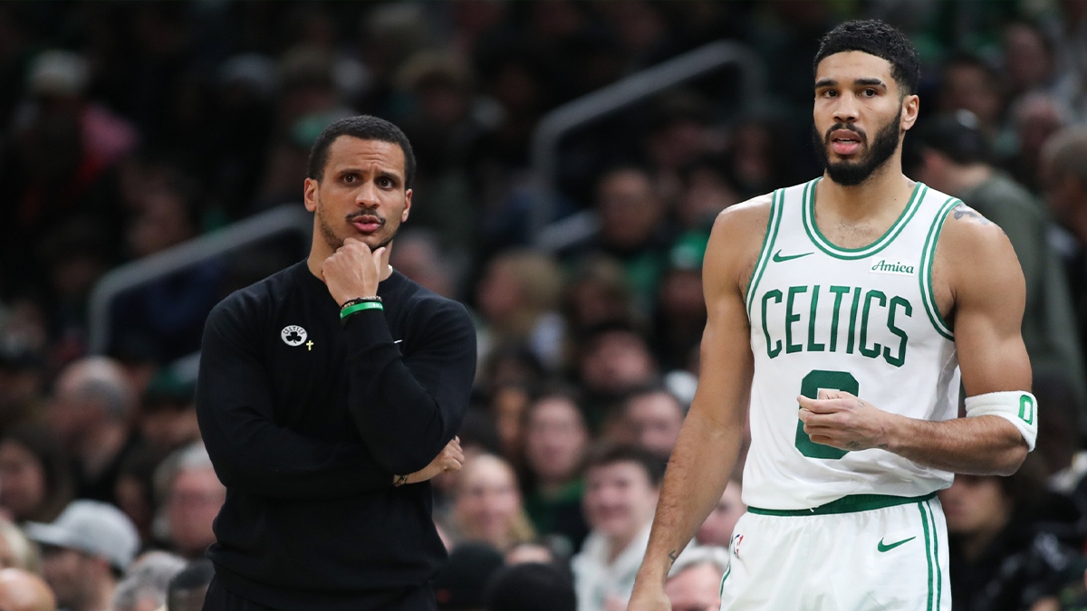 Boston Celtics coach Joe Mazzula and Boston Celtics forward Jayson Tatum (0) react during the first half against the Memphis Grizzlies at TD Garden. 