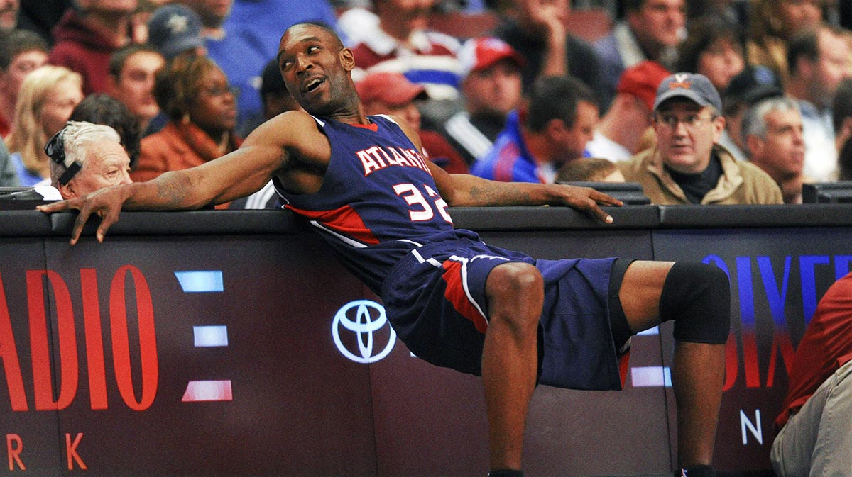 Atlanta Hawks forward Joe Smith (32) waits to be subbed in at the scorers table during the third quarter against the Philadelphia 76ers at the Wachovia Center. The Hawks defeated the 76ers 100-86.