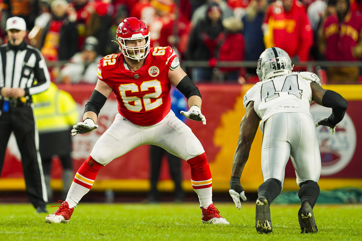 Kansas City Chiefs guard Joe Thuney (62) looks to block against Las Vegas Raiders defensive end K'Lavon Chaisson (44) during the second half at GEHA Field at Arrowhead Stadium.