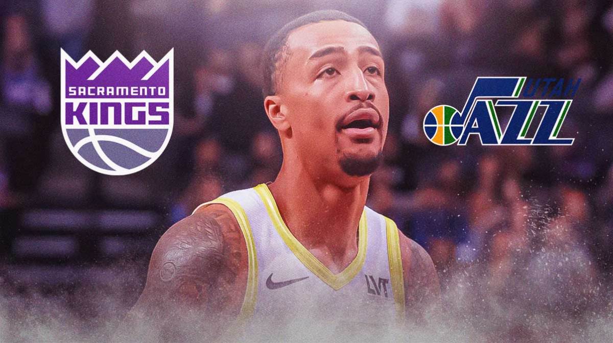 Jazz forward John Collins next to the Kings logo with the Jazz logo in the background John Collins trade to Kings
